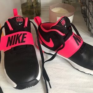 Girls pink and black NIKE sneakers